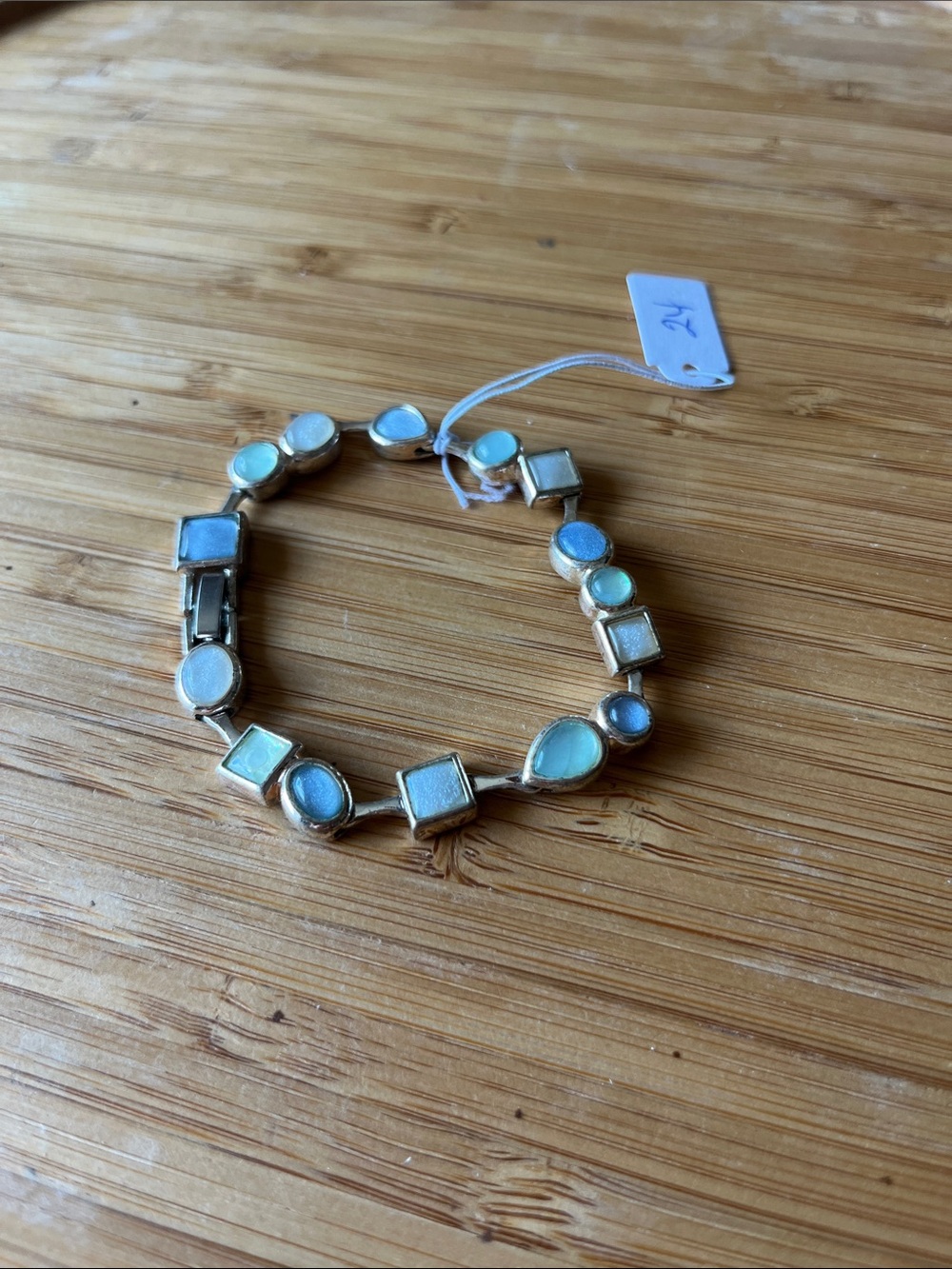24 Bracelet With Different Shaped Multi Colored Stones